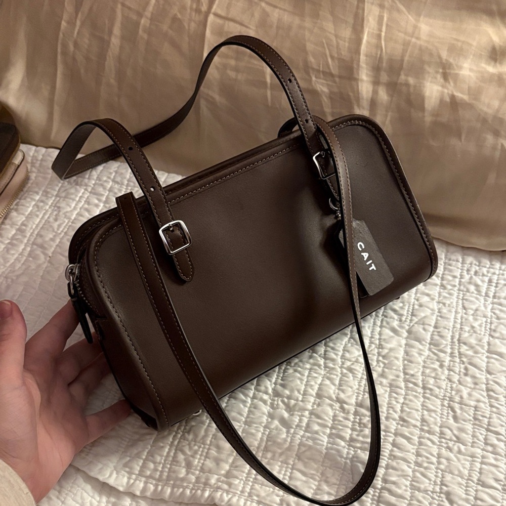 Coach Swing Zip Maple